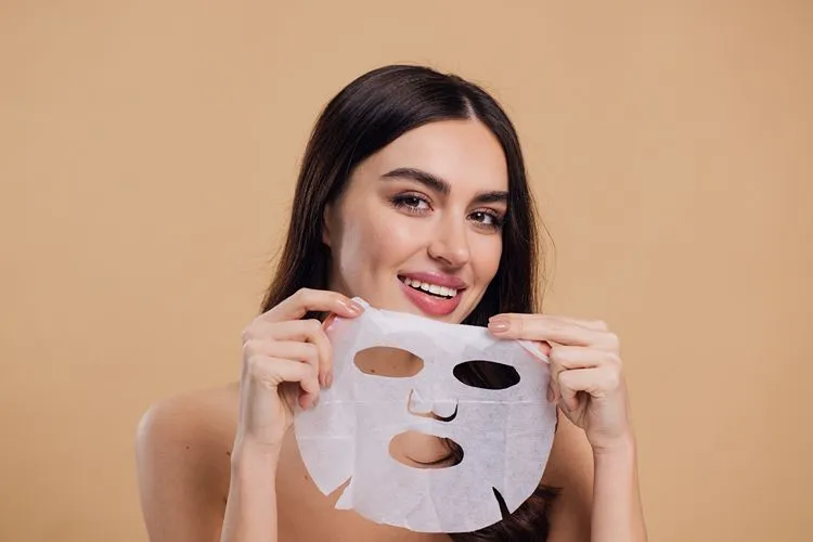 Woman wearing K-beauty sheet mask